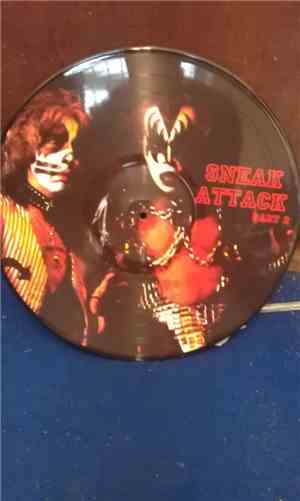Kiss - Sneak Attack Part 2 / Kiss My Axe 1978