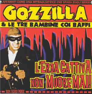 Gozzilla E Le Tre Bambine Coi Baffi - L'Erba Cattiva Non Muore Mai