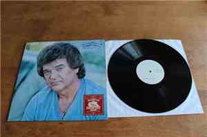 Conway Twitty - Rest Your Love On Me